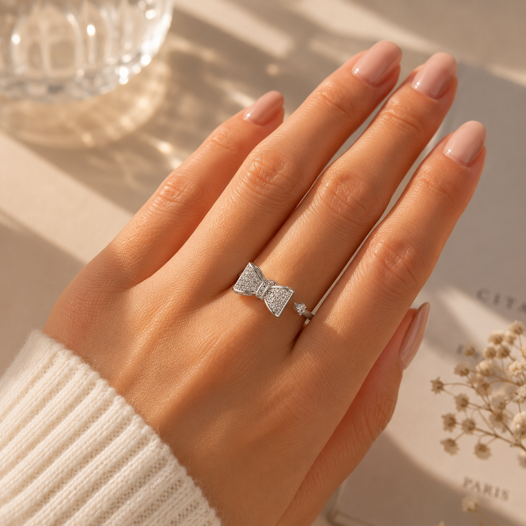 Celest Crystal Bow Spinner Ring