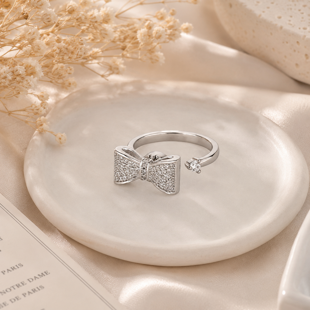 Celest Crystal Bow Spinner Ring
