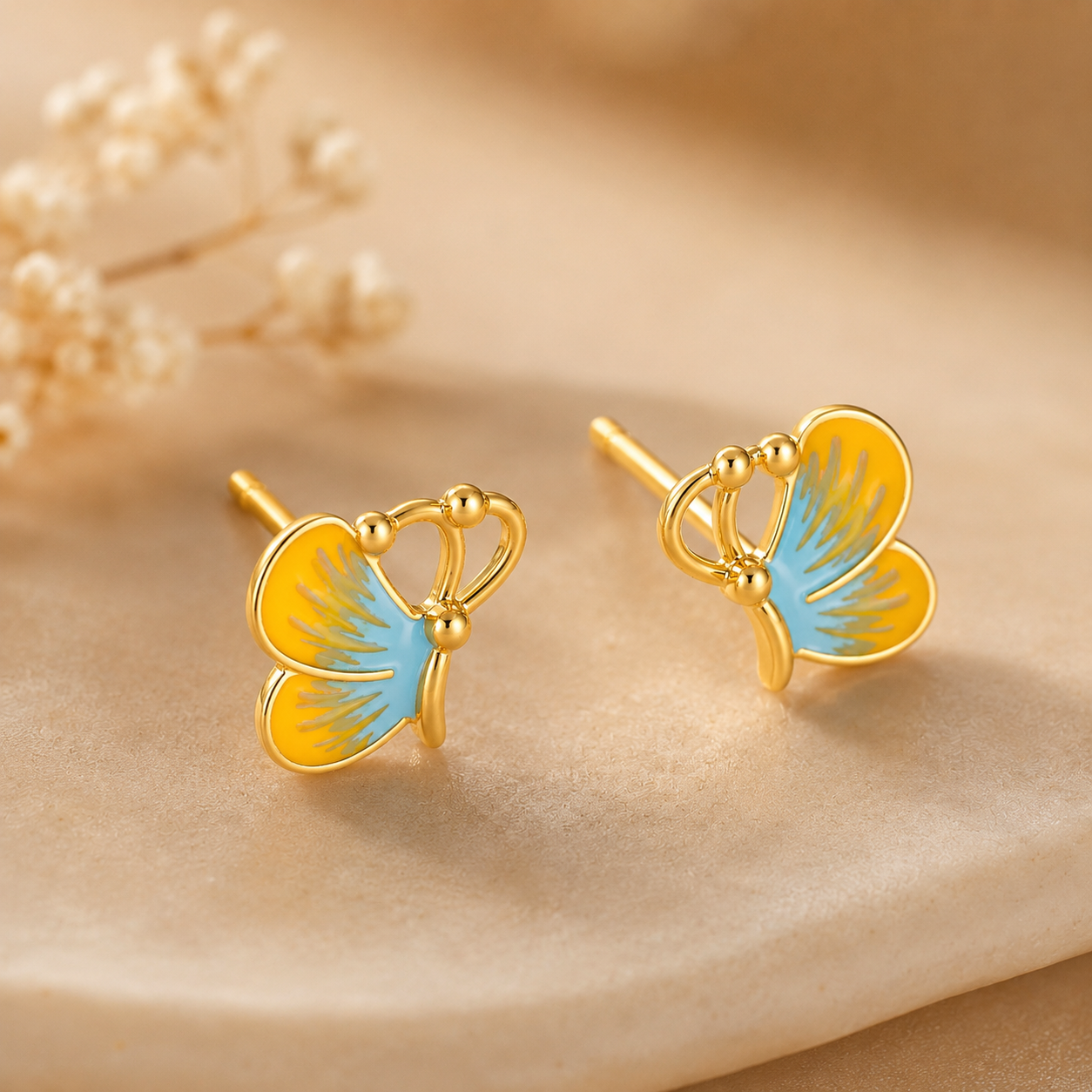 Butterfly Glow Stud Earrings